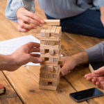 People playing Jenga