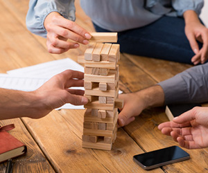 People playing Jenga