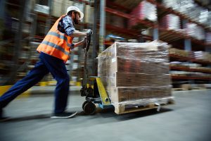 Plant worker moving inventory