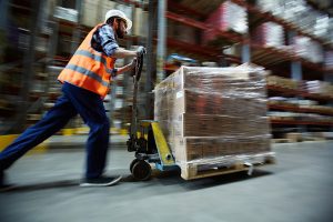 Plant worker moving inventory