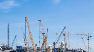 factory construction with cranes