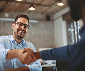 Project stakeholder shaking hands