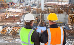 construction workers viewing plans